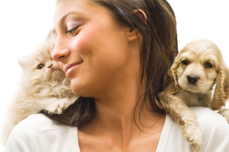 relationships woman with cat and dog